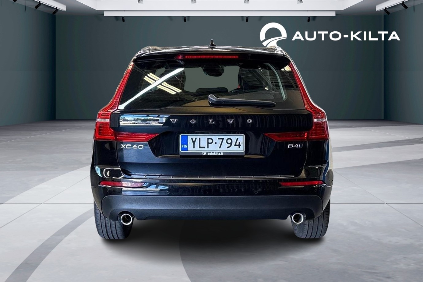 Esittelykuva Volvo XC60 kevythybridiautosta.